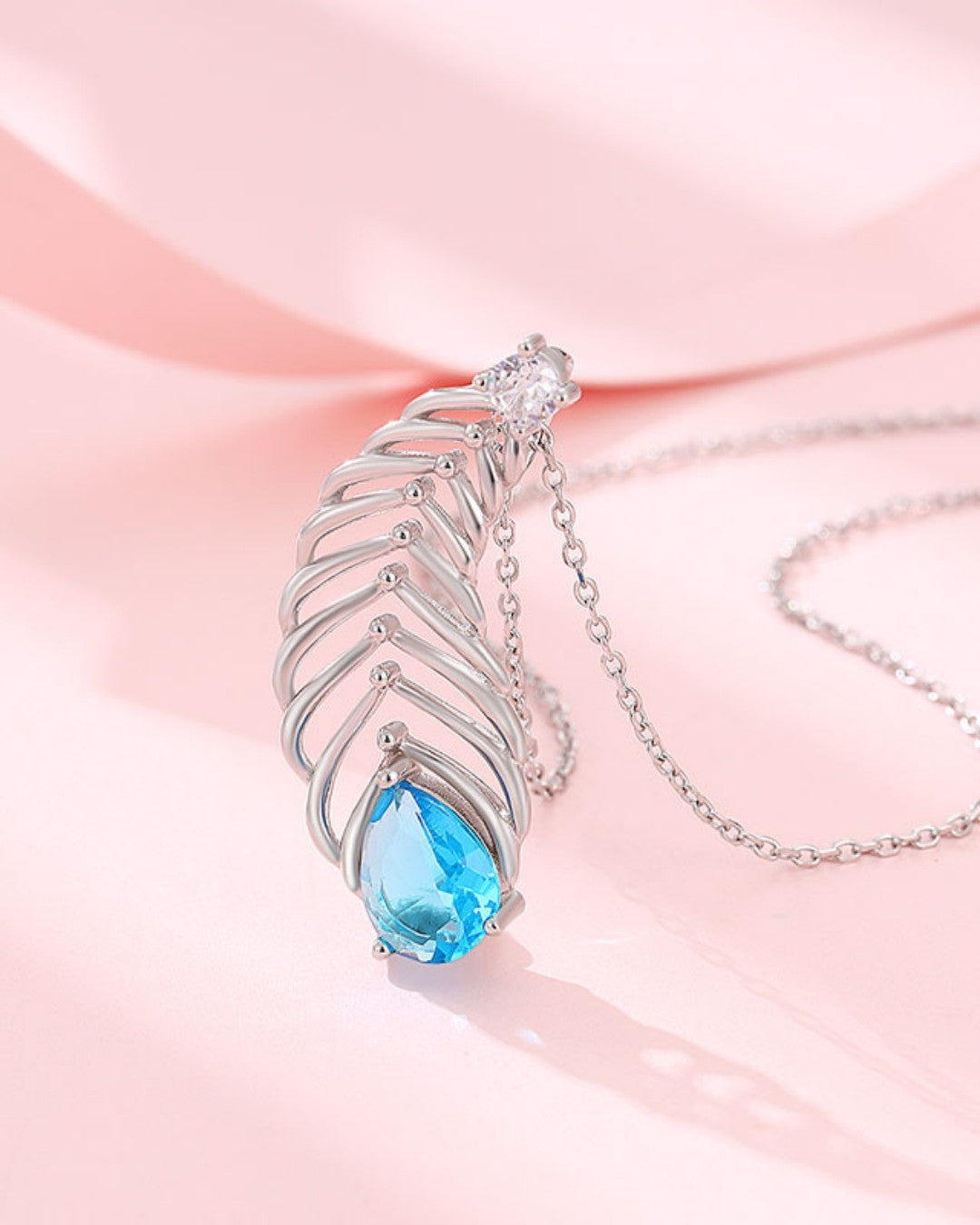 Silver Feathered Ocean Blue Pendant Necklace