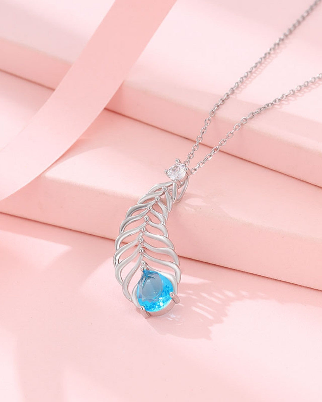 Silver Feathered Ocean Blue Pendant Necklace