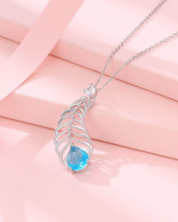 Silver Feathered Ocean Blue Pendant Necklace - Image 3